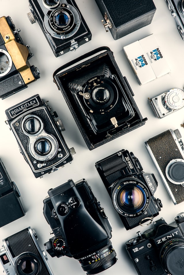 photo of vintage and modern cameras viewed from the top
